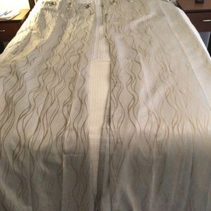 Beige colored black out curtains